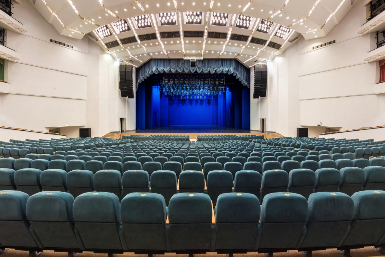 minsk belarus august 2 2016 interior white conference concert hall theatre with blue scene green seats