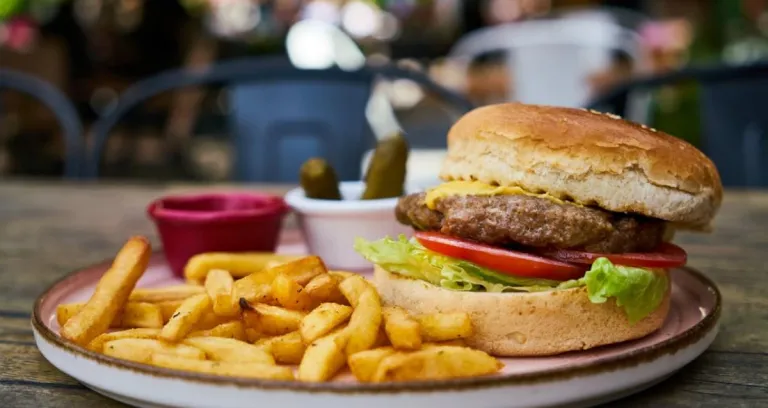 Burger And Fries On White Plate