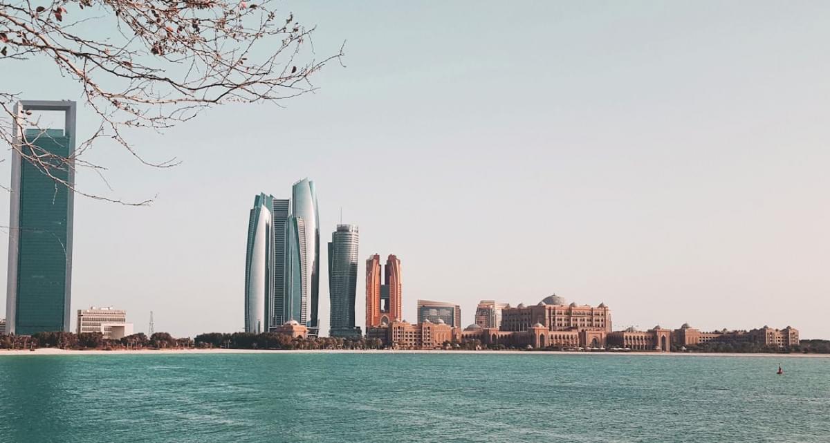 body of water near buildings abu dhabi