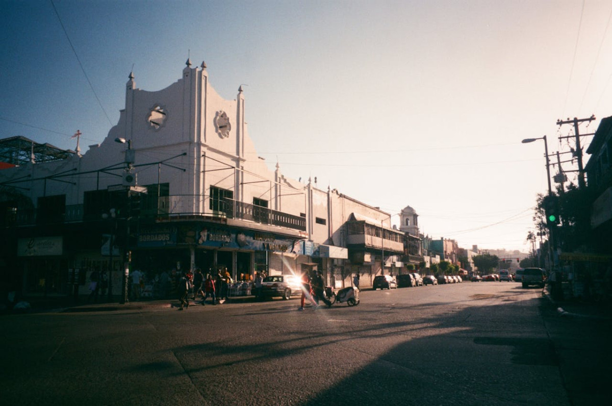 buildings by sunlit street in town 1