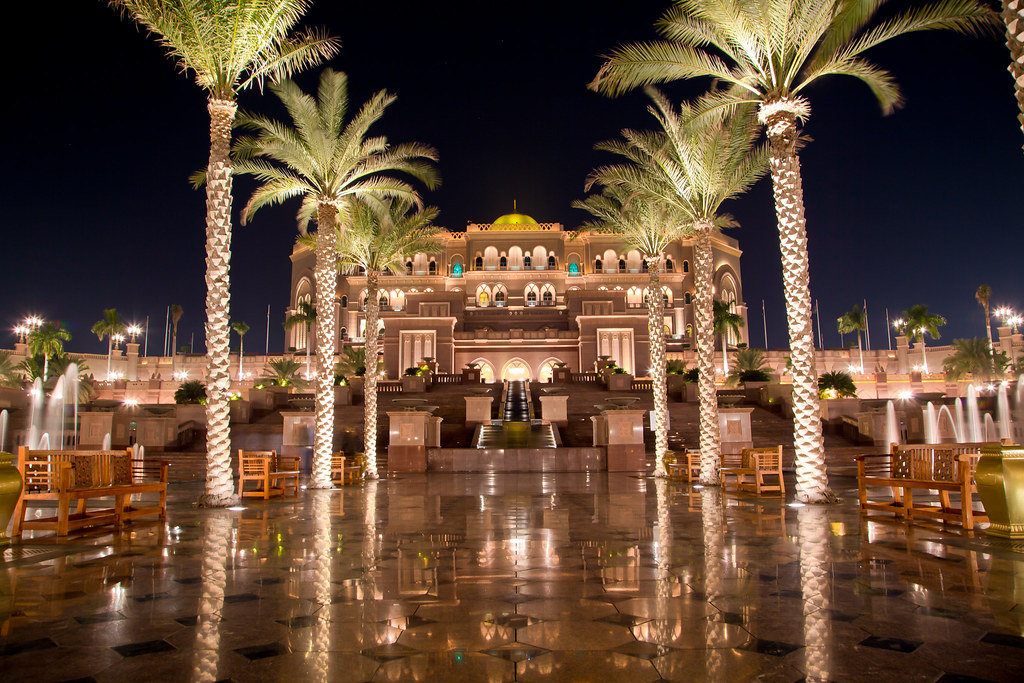 emirates palace at night in abu dhabi