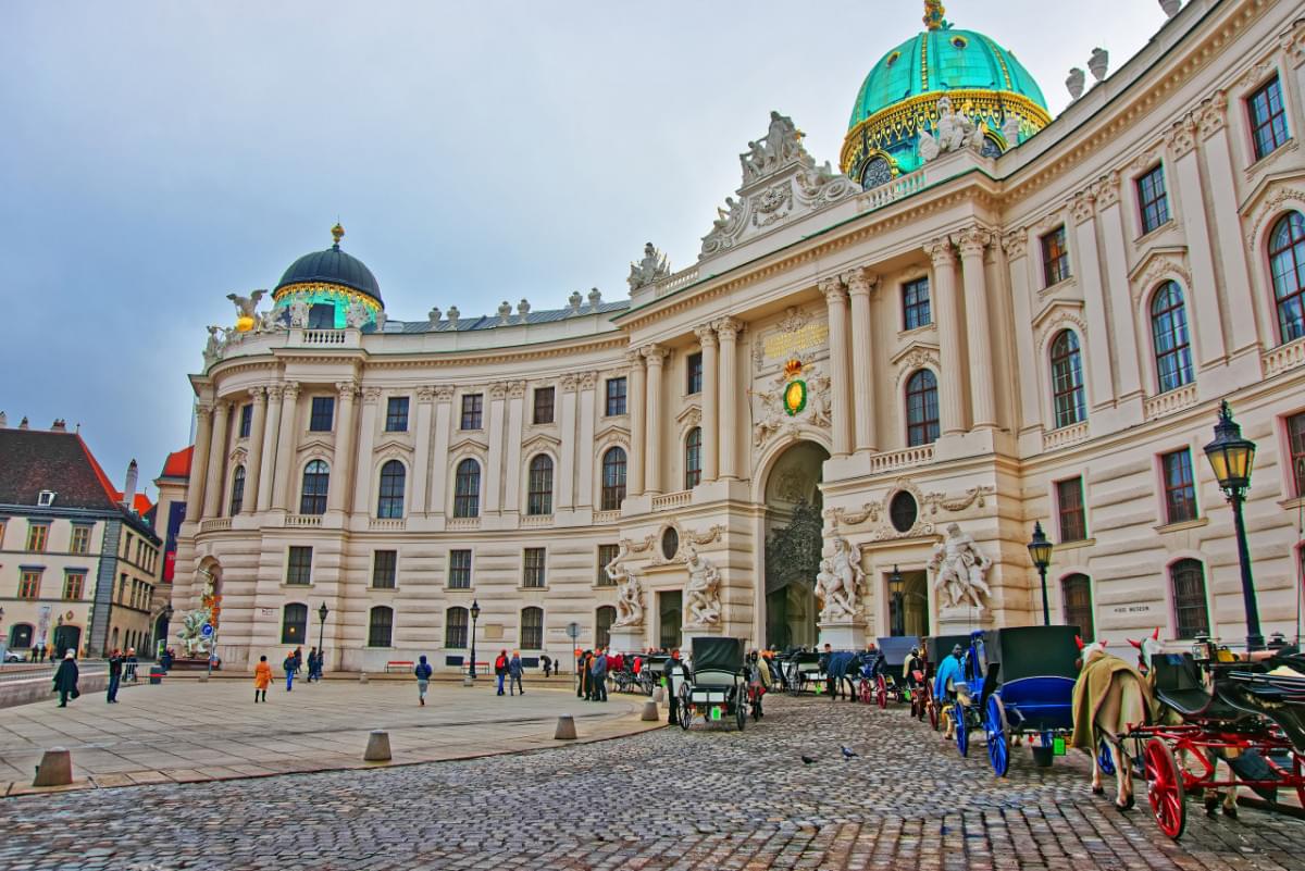 vienna austria january 8 2014 fiacre st michael wing hofburg palace vienna austria people background