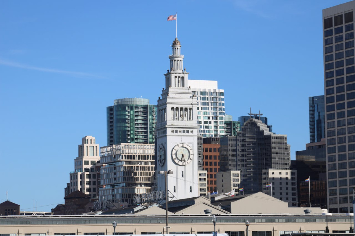 historical ferry building beside high rise buildings 1