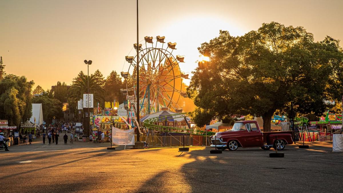 sunset at sacramento fair with ferris wheel