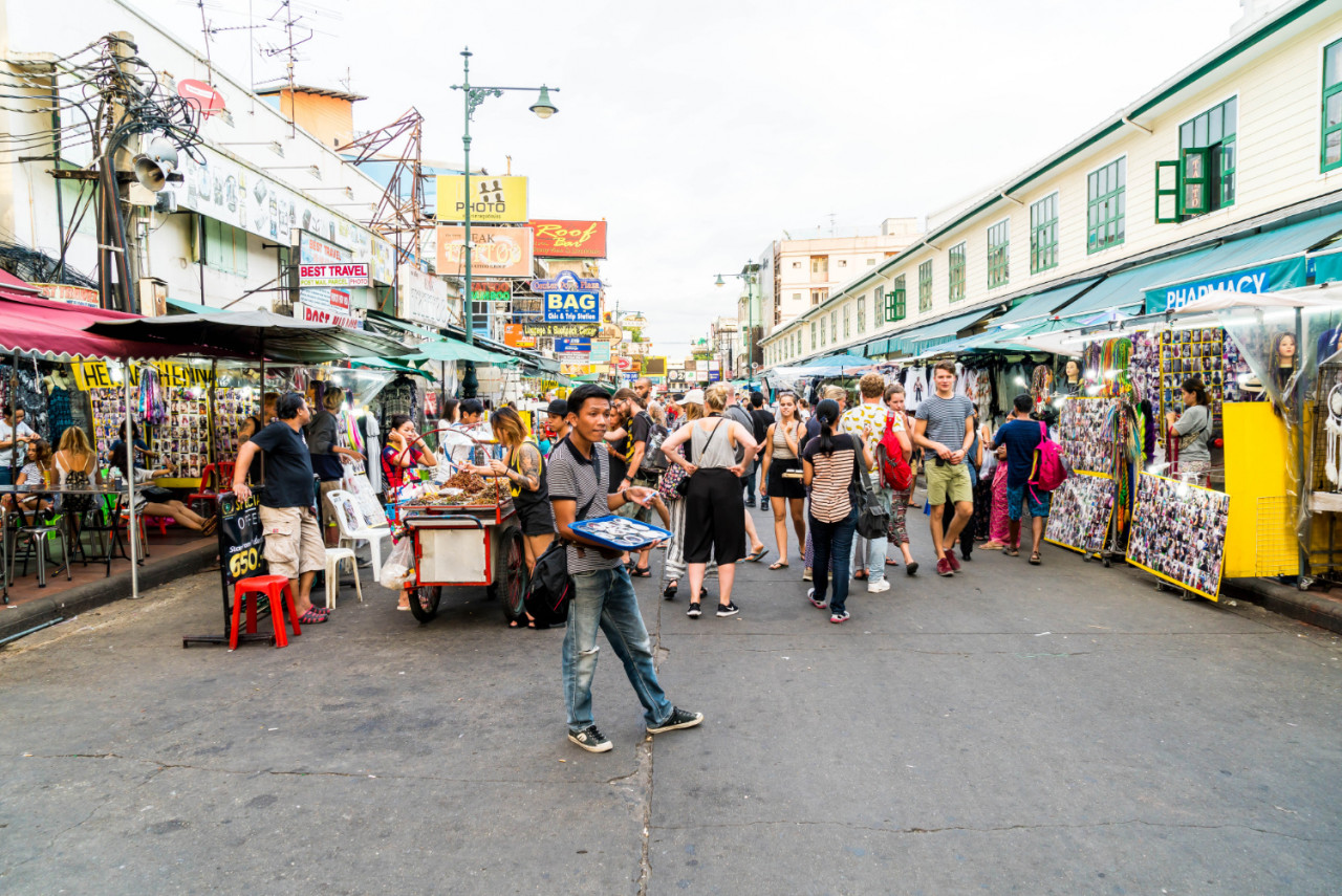 tourists locals walk along popular backpacker destination khaosarn